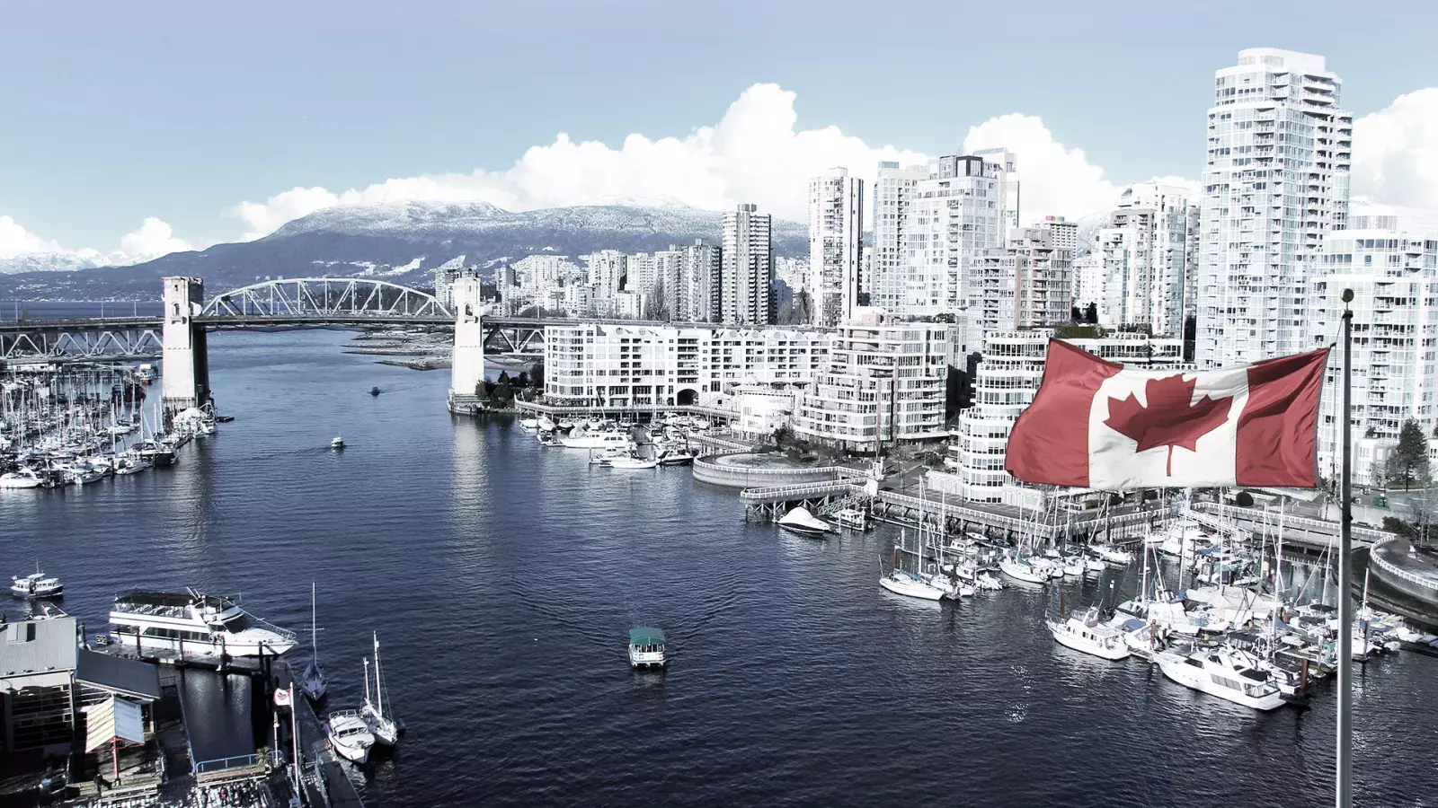 Canadian flag in front of Vancouver